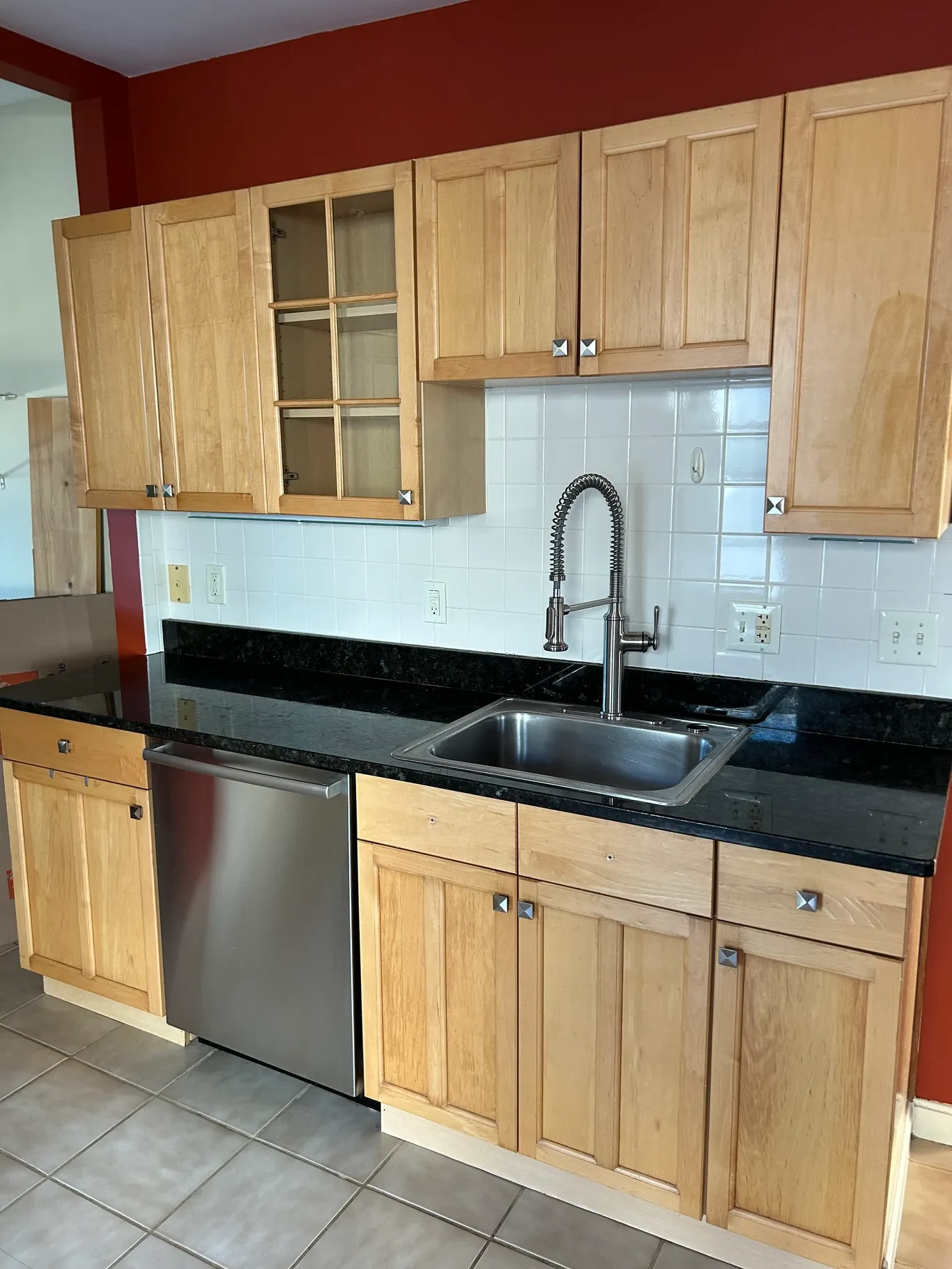 Clean kitchen sink and cabinets